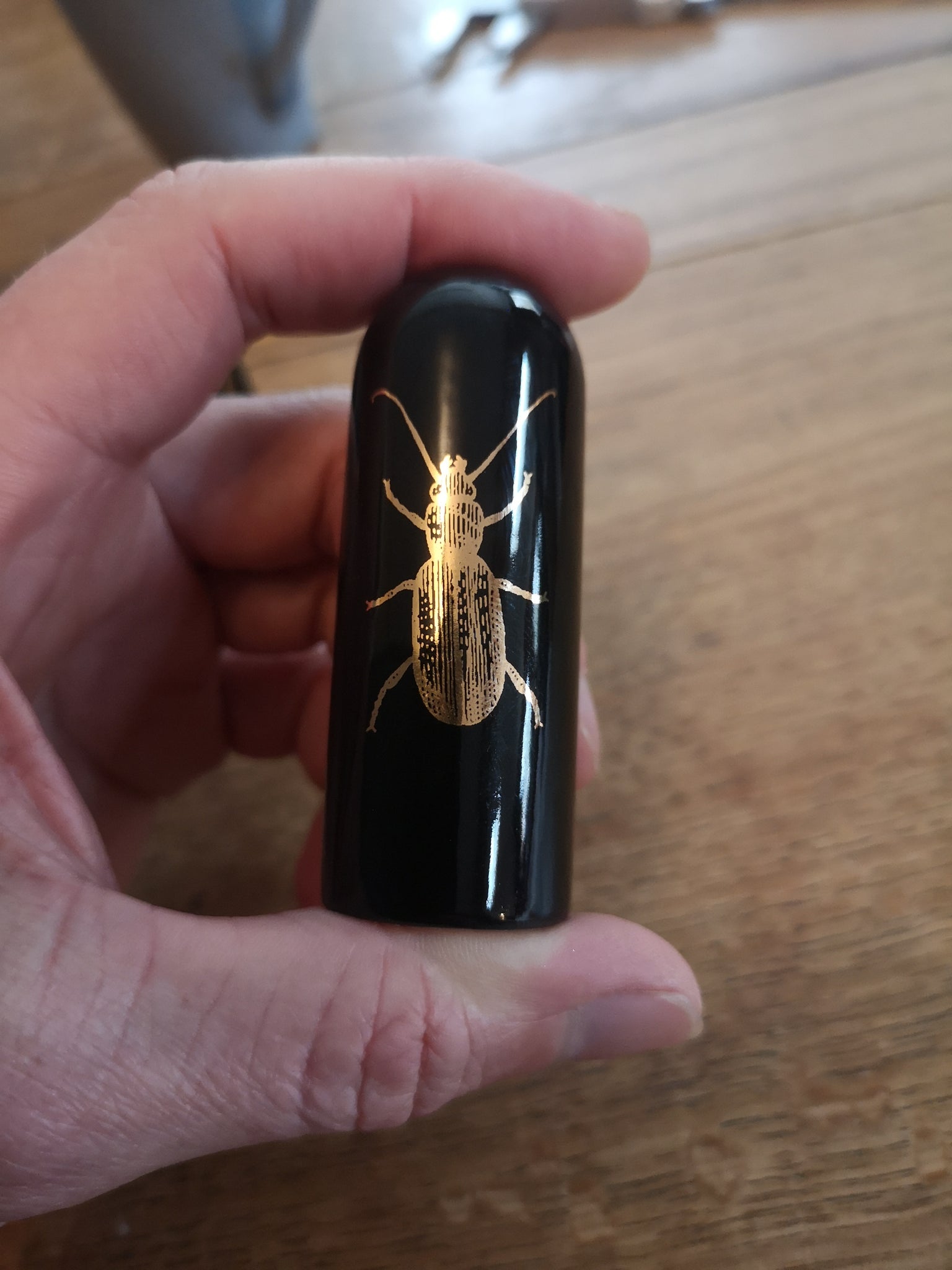 22 carat gold (insect gods) 19mm internal diameter, 73mm in length sli ...